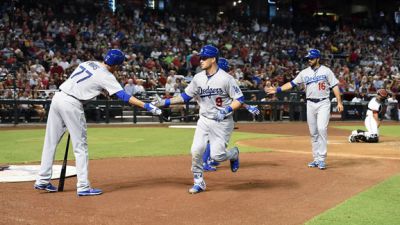 Grandal produce 4 y Dodgers gana en 10