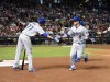 Grandal produce 4 y Dodgers gana en 10