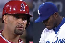 Pujols le gan 1er round a Puig