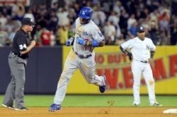 Yasiel Puig deja su huella en New York. Ya es parte de la historia